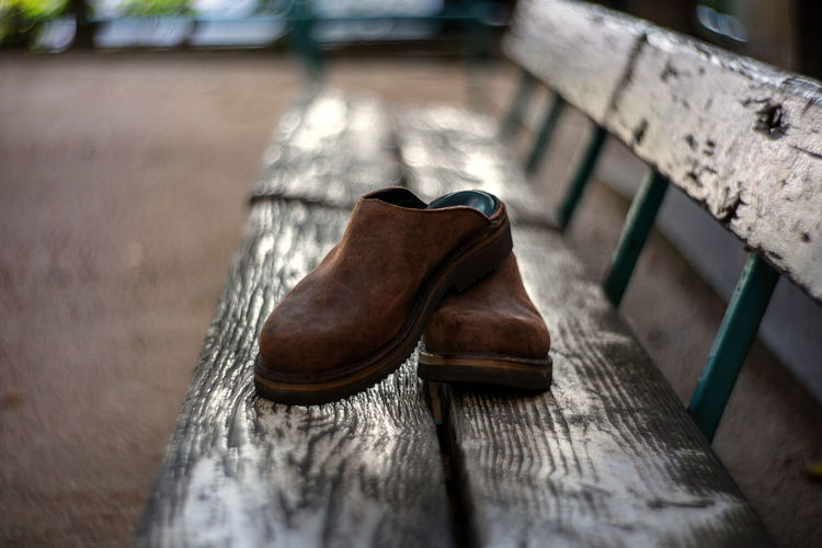 High angle view of shoes on bench