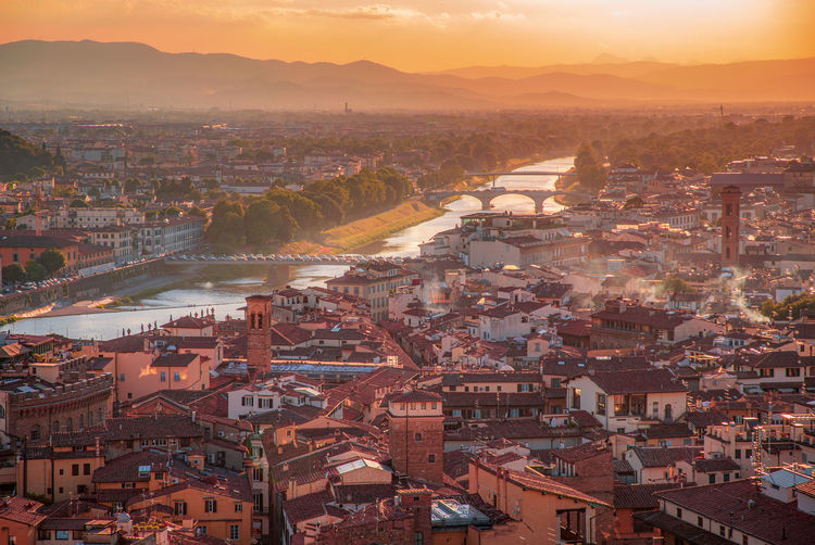 Panoramic overview from arnolfo tower  - torre di arnolfo at sunset haze.