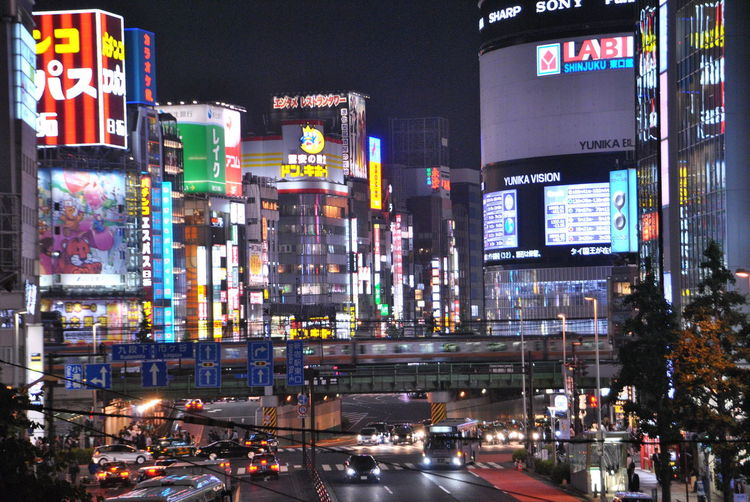 Traffic on road in city at night