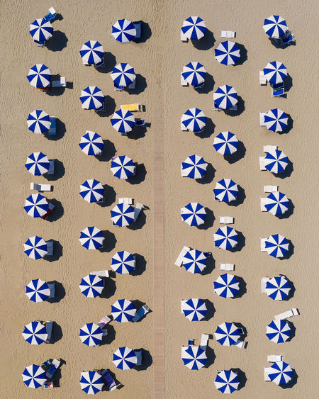 Aerial view of beach umbrellas on beach