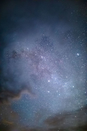 Low angle view of star field against sky at night