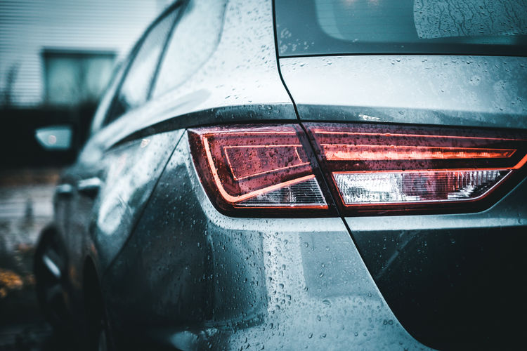 Close-up of wet car