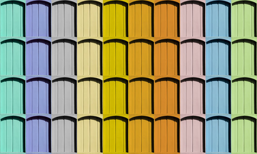 Full frame shot of multi colored arch windows
