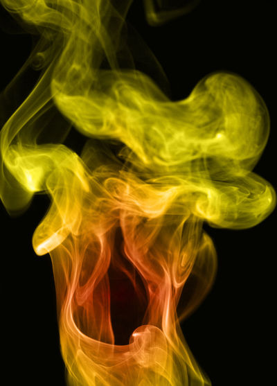 Close-up of smoke art against black background