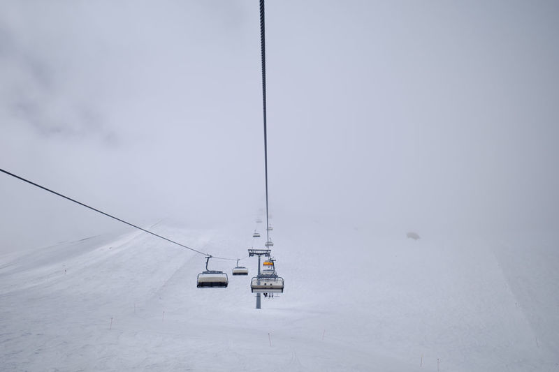 Ski lift on zugspitze, the only glacier ski area in germany. it was a cloudy and foggy day.