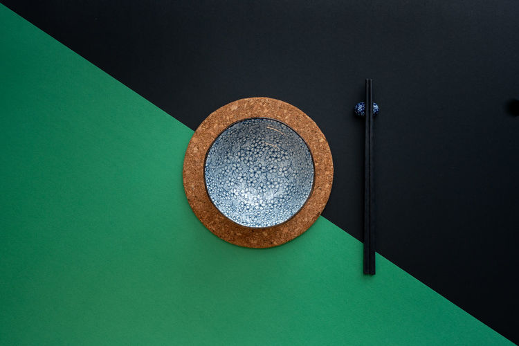 Directly above shot of navigational compass on table
