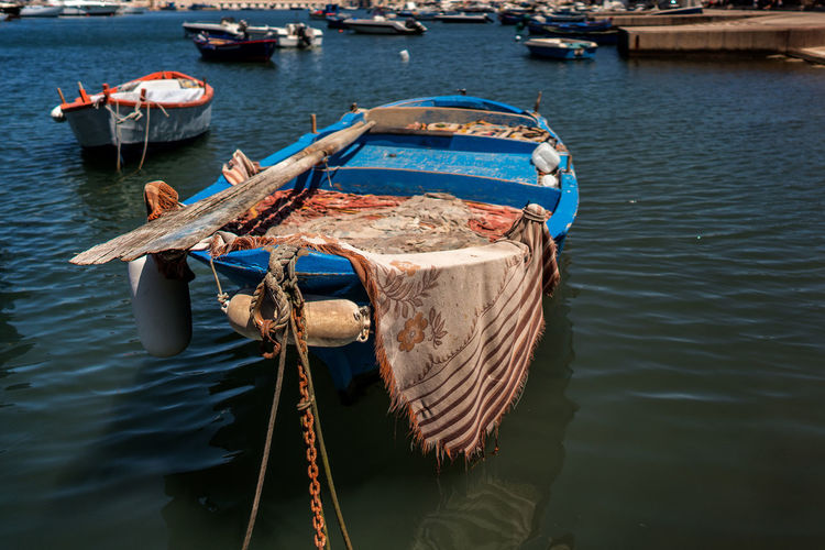 High angle view of fishing boat moored on sea