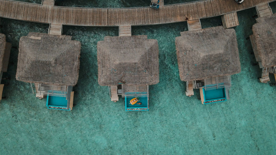 Drone footage of water bungalow in maldives islands