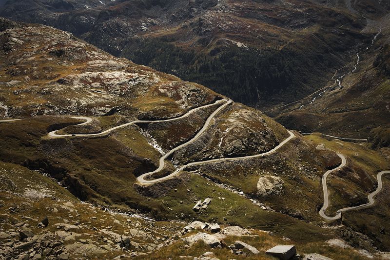 High angle view of alpine winding road