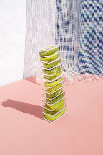 Close-up of fruit in stack on table