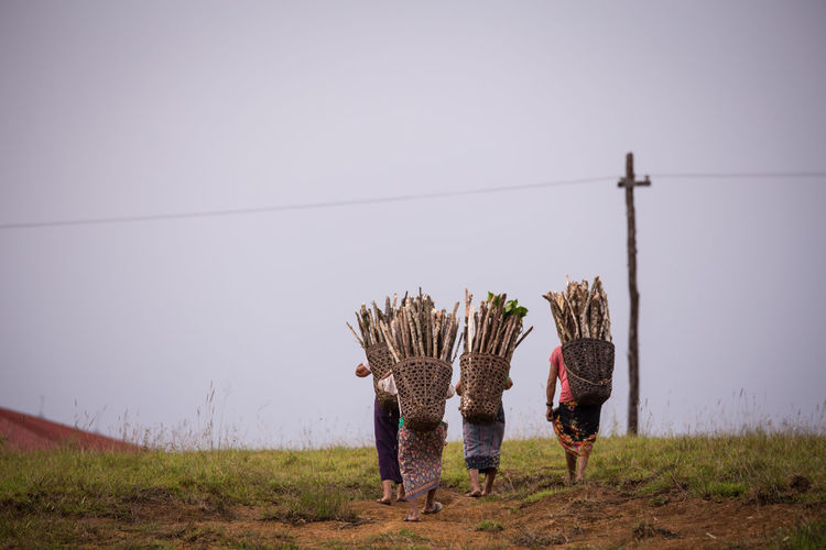 Women carrying firewood