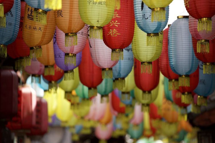 Full frame shot of multi colored lanterns hanging outdoors