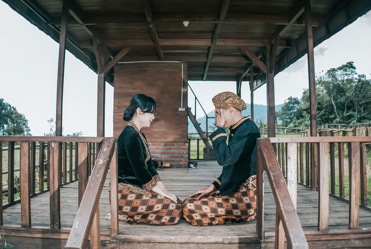 Traditional clothes of central java, indonesia.  specifically batik is used in weddings
