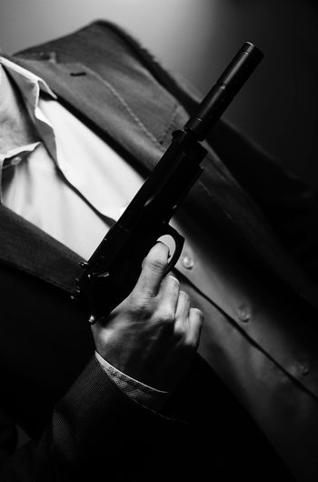 Close-up of man holding camera