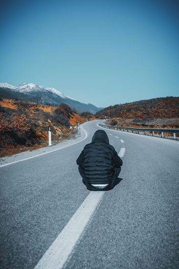 View of country road against clear sky