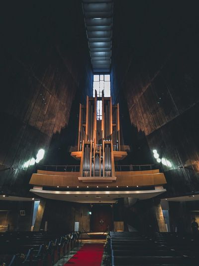 Low angle view of illuminated ceiling in building