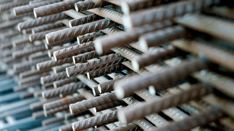 Full frame shot of metal rod in factory