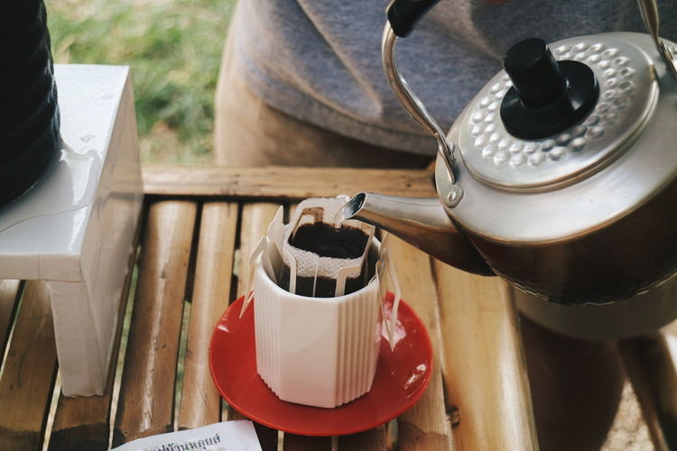 High angle view of coffee cup on table