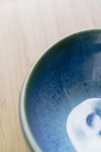 Close-up of coffee cup on table