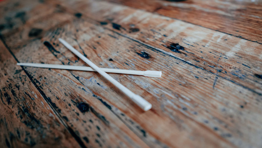 Close-up of chopsticks on table