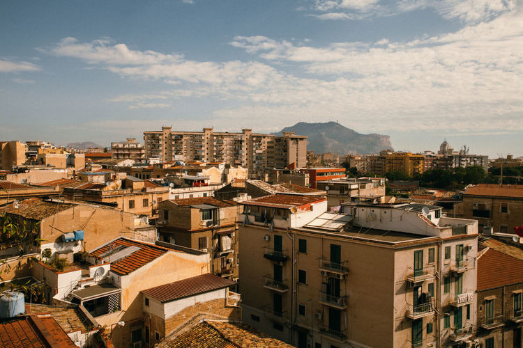 The view over city with old buildings and roofs , architecture in palermo.