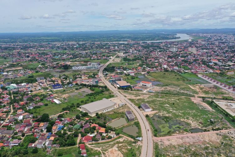 High angle view of buildings in city against sky