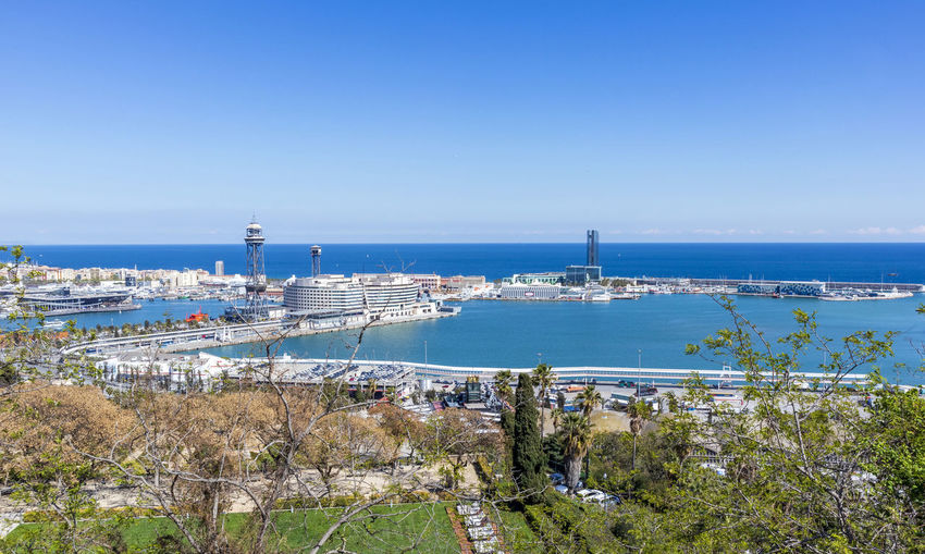 Skyline of barcelona from montjuic mountain overlooking the port and t