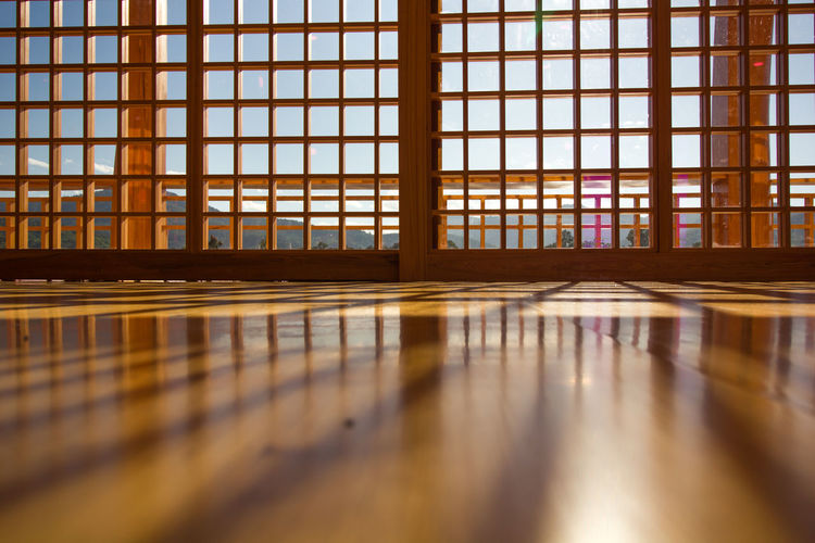 Reflection of window on glass floor