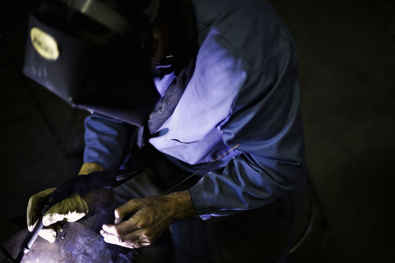 Cropped hand working in industry