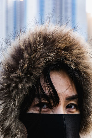 Close-up portrait of woman with winter