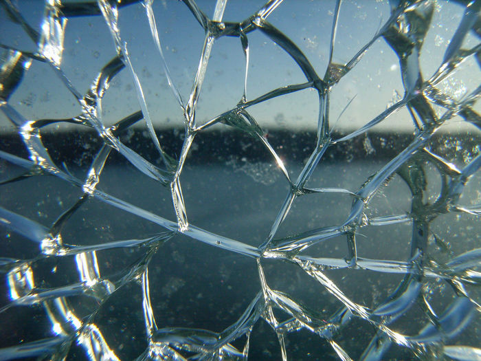 Lake seen through shattered glass