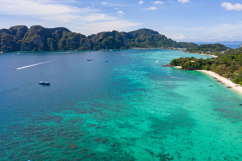Phi phi island and tourist boat at krabi thailand aerial view