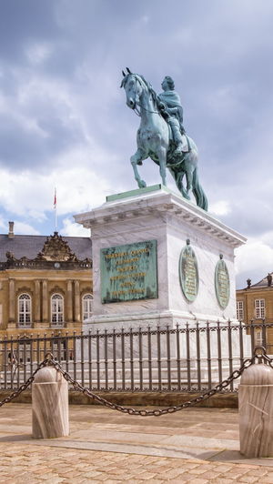 Statue frederick v by jacques francois joseph saly, amalienborg palace square,  copenhagen, denmark
