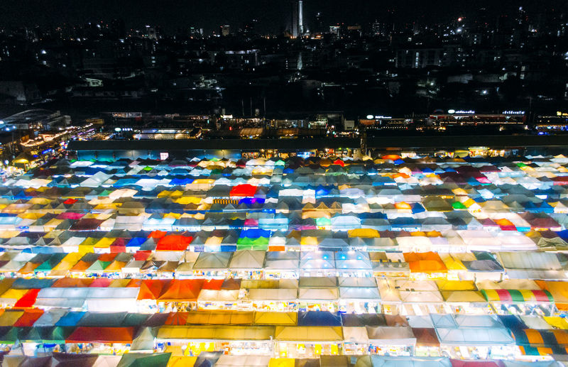 High angle view of illuminated buildings at night