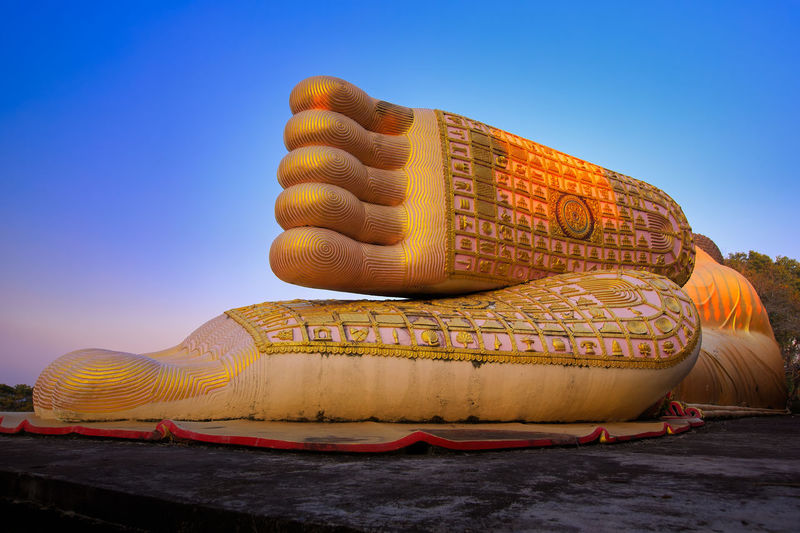 Big buddha footprint with clear sky in wat phra that suthon mongkhon khiri temple
