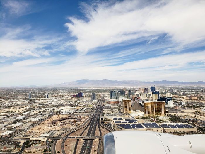 High angle view of buildings against sky in city