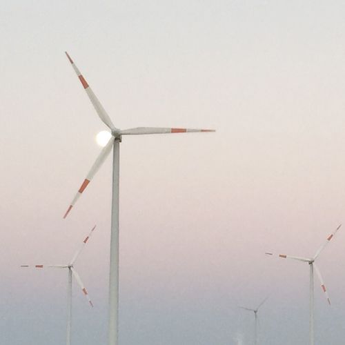 Wind turbine on countryside landscape