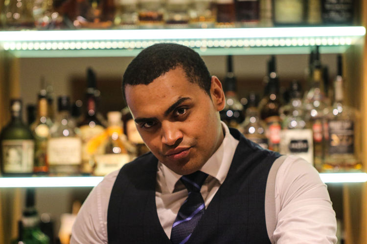 Portrait of bartender in bar