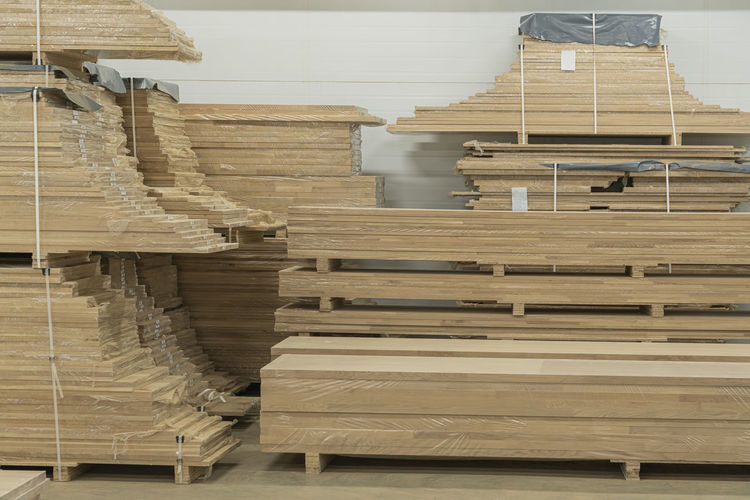 Oak furniture boards in the warehouse of woodworking production