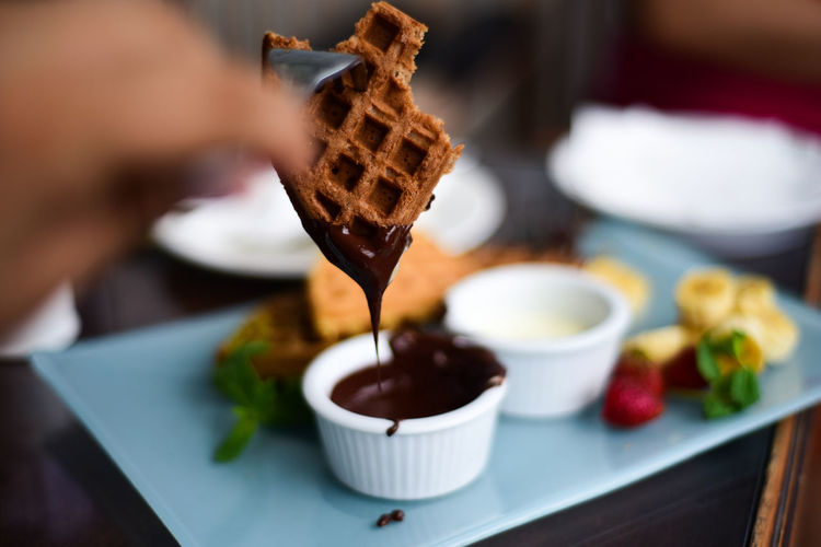 Close-up of waffle with chocolate sauce