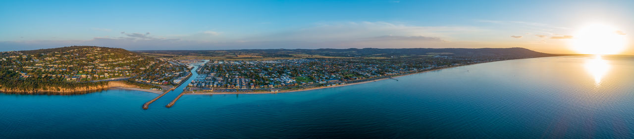 Panoramic view of cityscape by sea