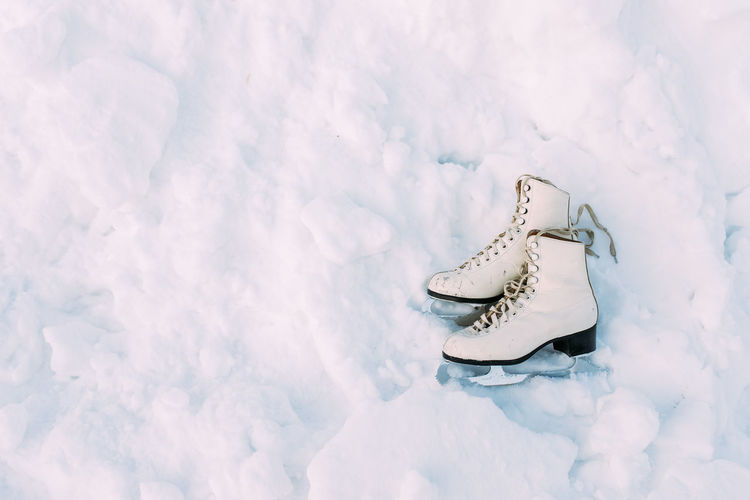 High angle view of shoes on snow