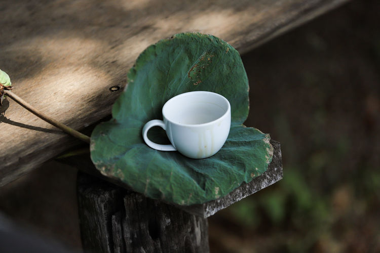 High angle view of coffee cup on table