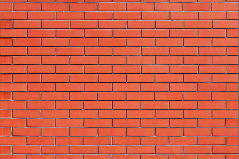 Full frame shot of orange brick wall