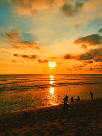 Scenic view of sea at sunset