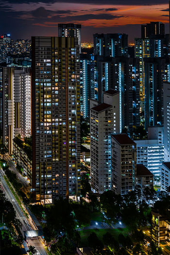 Illuminated buildings in city at night