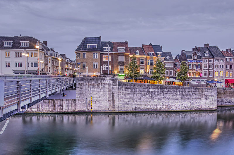 Riverfront in maastricht, the netherlands, during the blue hour
