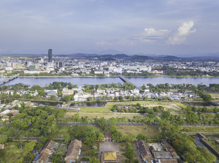 Hue city in vietnam where have many beautiful beach, flowers, fields of rice. it's a big citadel