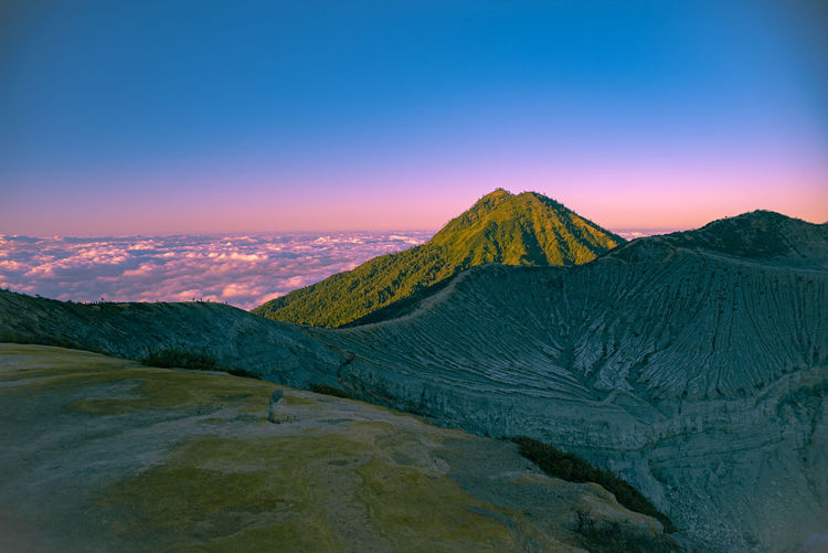 Scenic view of mountain against sky during sunrise at ijen mount, indonesia. colorful sky sunrise. 
