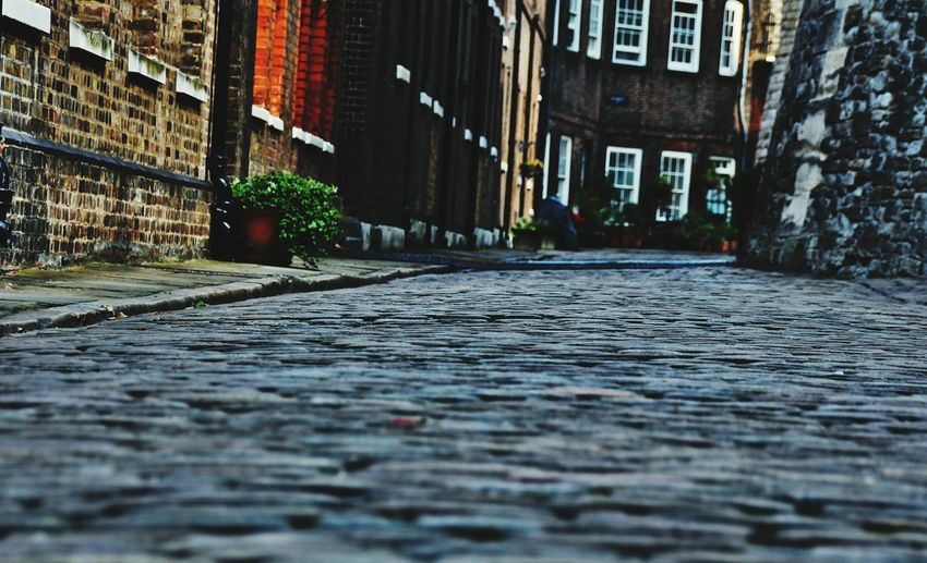 Cobblestone street in city